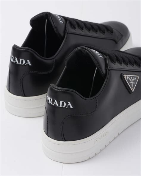 prada brown leather sneakers|black and white prada sneakers.